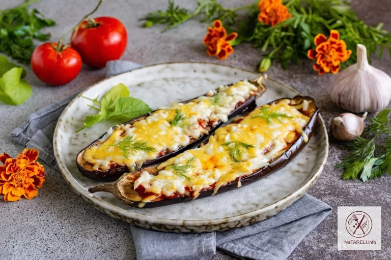 Baked eggplant boats with satsebeli sauce and cheese