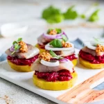 Potato appetizer with beets and herring