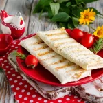 Lavash envelopes with cottage cheese and hard cheese